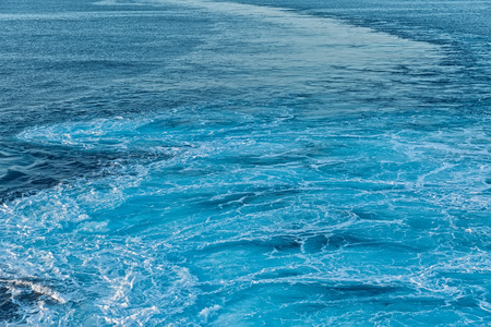 Blue abstract wave ocean water backgroundの写真素材