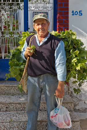 Amorgos Island, Greece - October 2015: Greek man posing.The people in Greece are affraid how the Greek debt crisis has his impact on there lives and workのeditorial素材