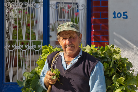 Amorgos Island, Greece - October 2015: Greek man posing.The people in Greece are affraid how the Greek debt crisis has his impact on there lives and workのeditorial素材