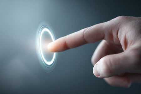 Human finger touching glowing futuristic button, symbol of technology, innovation and digital control.の素材