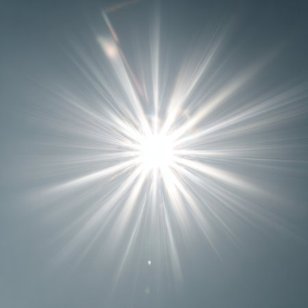 Intense radial burst of white light, abstract image representing revelation and visual strength.の素材