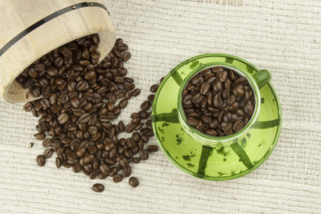 spilled coffee beans coffee mug old coffee grinderの写真素材
