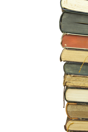 Front view of old books stacked on a shelf. Books without title and author. Isolated on white background place for your text.の写真素材