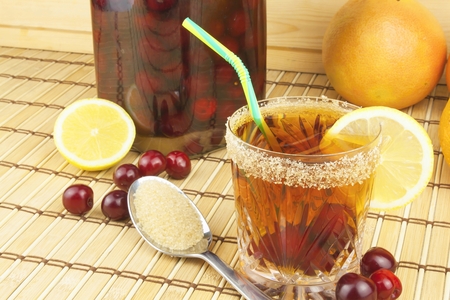 Glasses with cherries with rum. Preparing for summer refreshment cocktail. Cane rum and sugar. Sour pickled in rum.の写真素材