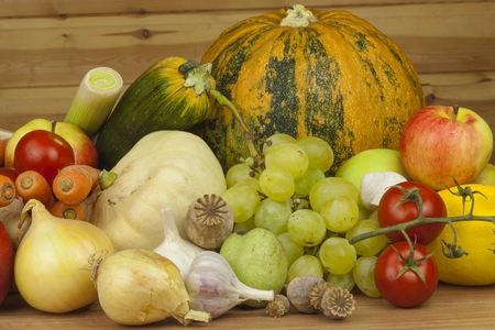 Fresh organic fruits and vegetables from local farms. Diet raw food ready to eat. Fruit and vegetables on the farm.の写真素材