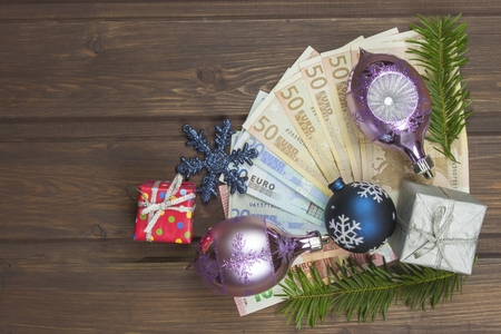 Christmas and money. Christmas decoration with banknotesの写真素材