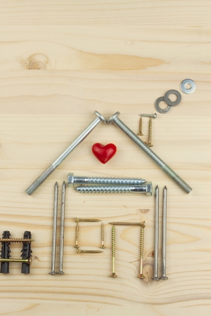 Mortgage to build a house for the family. Real money to build a house. The loan money for housing. Construction of a new house. Plans for the building. Needs for builders.の写真素材