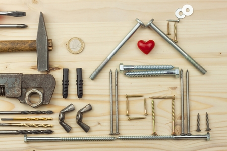 Mortgage to build a house for the family. Real money to build a house. The loan money for housing. Construction of a new house. Plans for the building. Needs for builders.の写真素材