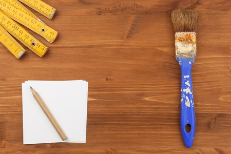 Paint brush on wooden background. Sales of paints and brushes. Housework. Supplies for painters.の写真素材