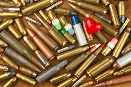 Gun control rights weapon. Different types of ammunition. The right to ownership of guns for defense.の写真素材
