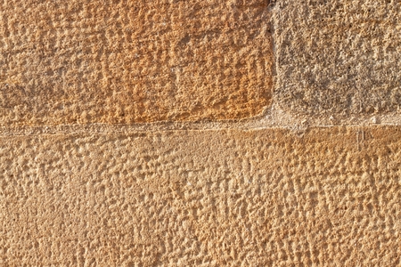Historical wall of sandstone. Details of sand stone texture