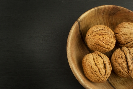 Super foods for human brain. Nuts on a wooden table. walnuts
