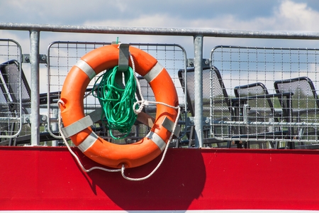 A rescue ring on the cruise ship's railing. Rescue the drowning. Safety equipment