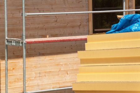 Polystyrene insulation of wood buildings. Eco-friendly building insulationの写真素材