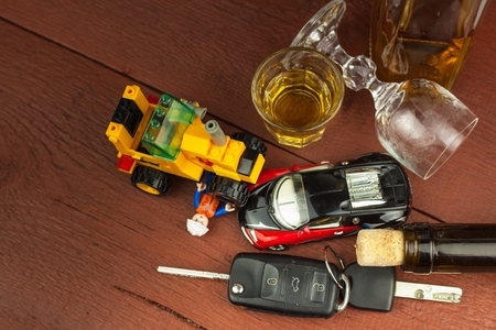 Driving under the influence of alcohol.  Dangerous ride. Alcohol behind the wheel. Drunken driverの写真素材