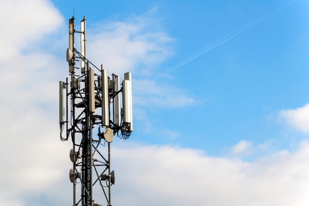 gsm column on a blue sky background. Mediation of the telephone signal. Modern technologyの写真素材