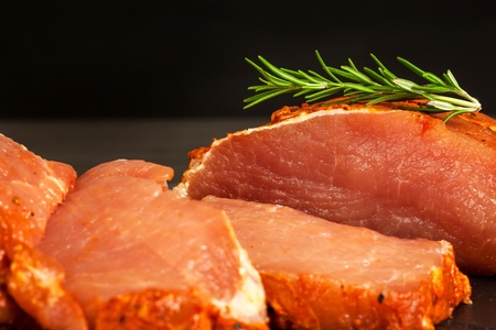 Marinated pork chop. Fresh sliced ??pork. Sale of meat. Preparation for grillingの写真素材