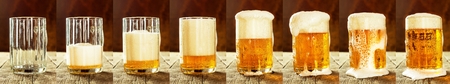 Glass of beer on a wooden table. Sales of alcohol.Beer panoramaの写真素材