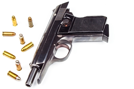 Pistols and hubs on a white background. Defense concept. Detail of the weapon. Right to bear arms