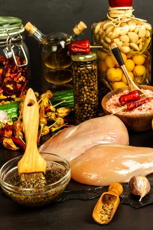 Raw chicken breasts. Preparing for summer barbecue. Diet Diet. Raw meat on grill. Grilling time.の写真素材