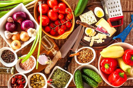 Preparation of vegetable salad with cheese. Diet healthy food. Summer salad with tomato and pepper....