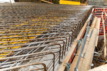Construction site of a road bridge in the countryside in the Czech Republic near the village of Rikonin. Concrete structure. Reinforcing iron.の写真素材
