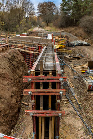 Construction site of a road bridge in the countryside in the Czech Republic near the village of Rikonin. Concrete structure. Reinforcing iron.の写真素材