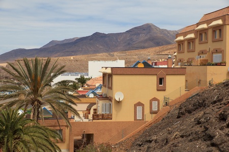 View of the Morro Jable city in Fuerteventura- Canary Islands and the mountains in the backgroundの写真素材