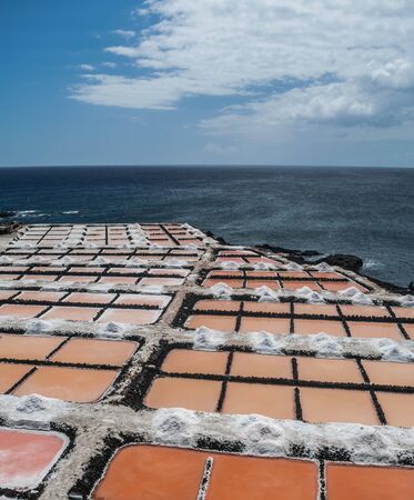 Fuencaliente saltworks, with Atlantic ocean background, La Palma, Canary islands, Spainの写真素材