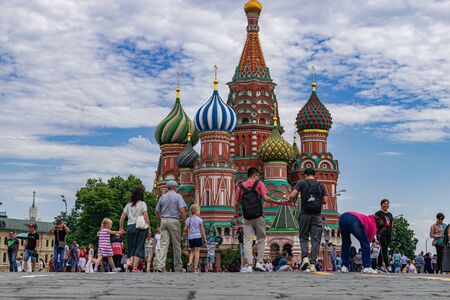 Moscow / Russia; June 22 2019: Saint Basil?s orthodox cathedral, with clouds background and tourists aroundのeditorial素材