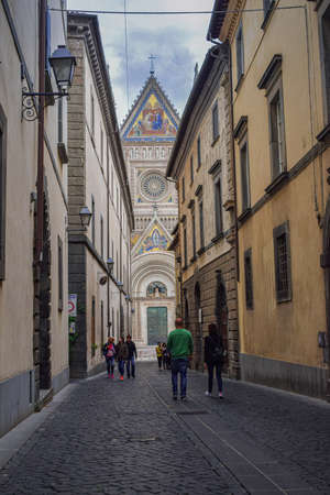 Orvieto, Umbria / Italy; September 11 2017: Orvieto Cathedral, Assumption of the Virgin Mary, with people walking around and taking photosのeditorial素材