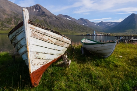 Old wooden boats in Siglufjordur harbour, Icelandの写真素材