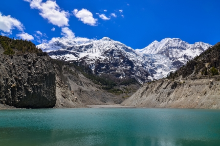Himalayas mountain peaks and lake in Annapurna area - Gangapurna lake, Nepalの写真素材