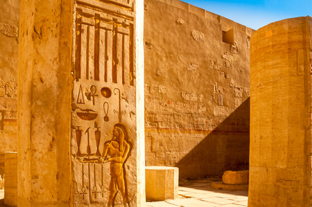 Detail of ancient hieroglyphs carved in stone walls Queen Hatshepsut temple Egyptの写真素材