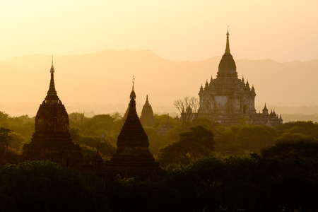 Beautiful sunset scenic view with silhouettes of temples in Bagan, Myanmar Burmaの写真素材