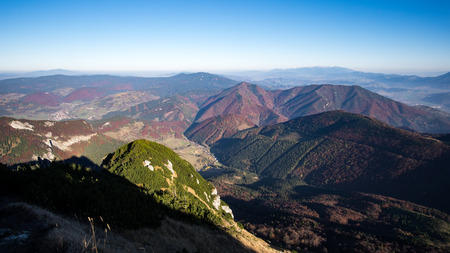 Landscape view of colorful mountain hills in fall, moody autumn style, Mala Fatra, Slovakiaの写真素材
