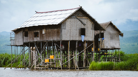 Landscape view of traditional wooden houses on Inle lake, Myanmar (Burma)の写真素材
