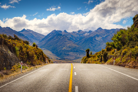 Scenic road through mountain landscape near Lake Hawea, South island of New Zealandの写真素材