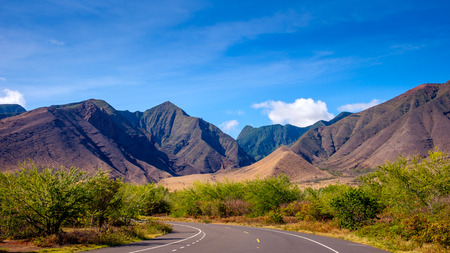 Landscape view of mountains on West Maui and the road, Hawaii, USAの写真素材