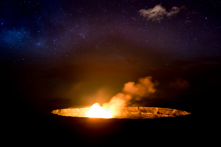 Landscape view of erupting volcano at night, Volcanoes national park, Hawaii, USAの写真素材