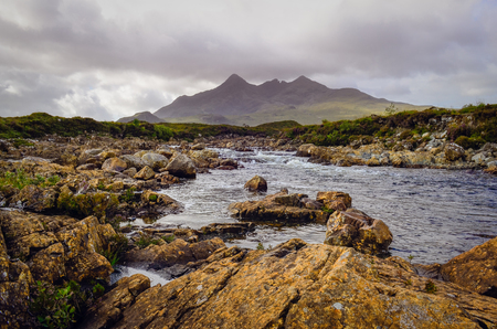 Landscape of Cuillin hills and river, Scottish highlands, United Kingdomの写真素材