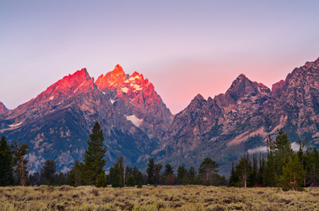 Mountain peaks at Grand Teton at sunrise, Wyoming, USAの写真素材