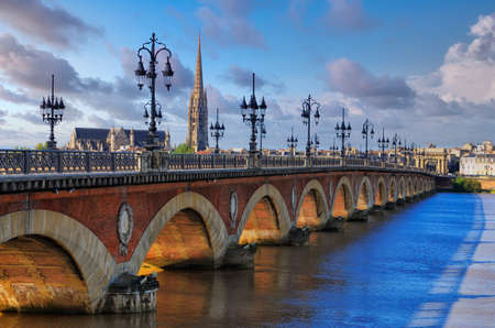 Scenic view of Bordeaux river bridge with St Michel cathedral and beautiful sky, Bordeaux, Franceのeditorial素材