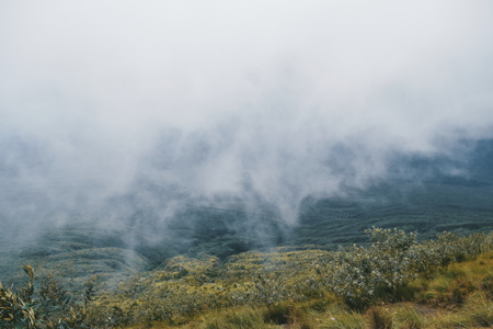 The volcanic crater on Mount Longonot against a foggy background, Rift Valley, Kenyaの写真素材