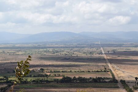 Scenic flat arid landscapes against sky in rural Kenya