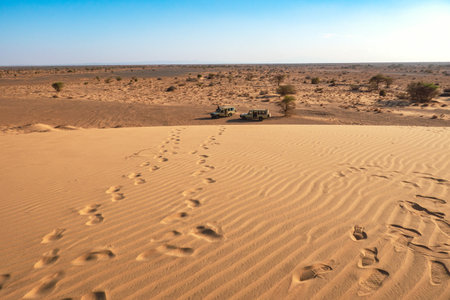 Off-road vehicle in the desert at North Horr Sand Dunes, Kenyaの写真素材