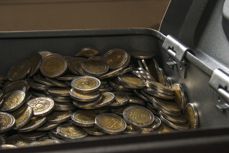 two peso coin on a group of focus coinsの写真素材