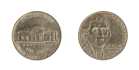 front and back of a american currency of five centsの写真素材