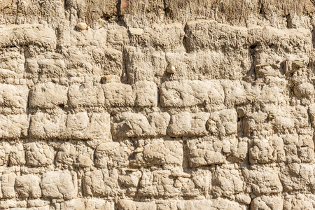 Old Andean adobe wall that occupies the whole picture and can be used as a backgroundの写真素材