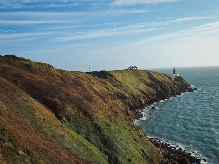Baily lighthouse in Ireland near Dublin, peninsula sea